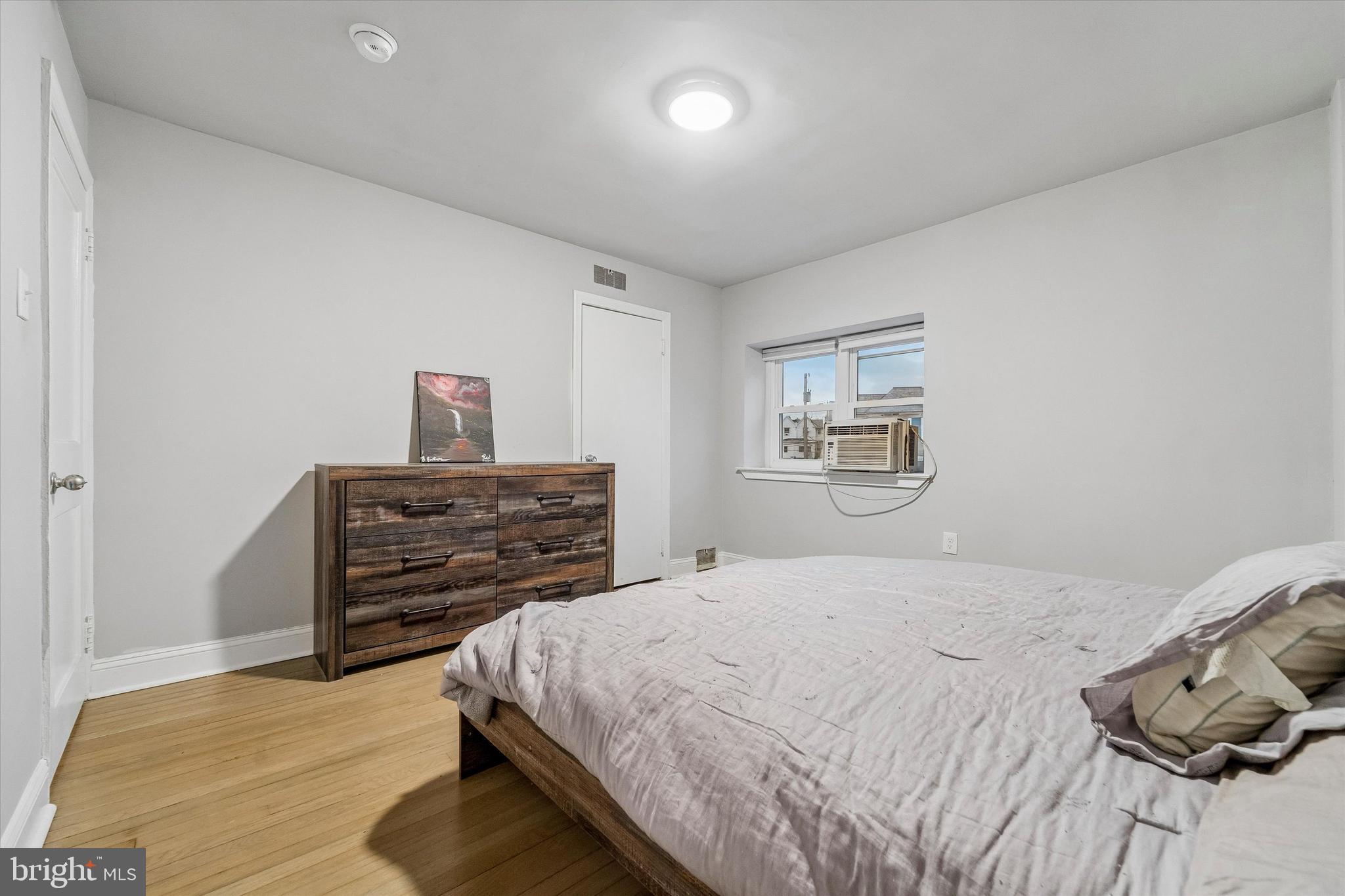 332 Springton Road Upper Darby, PA 19082 - Photo 11 of 15 a bedroom with a bed and furniture