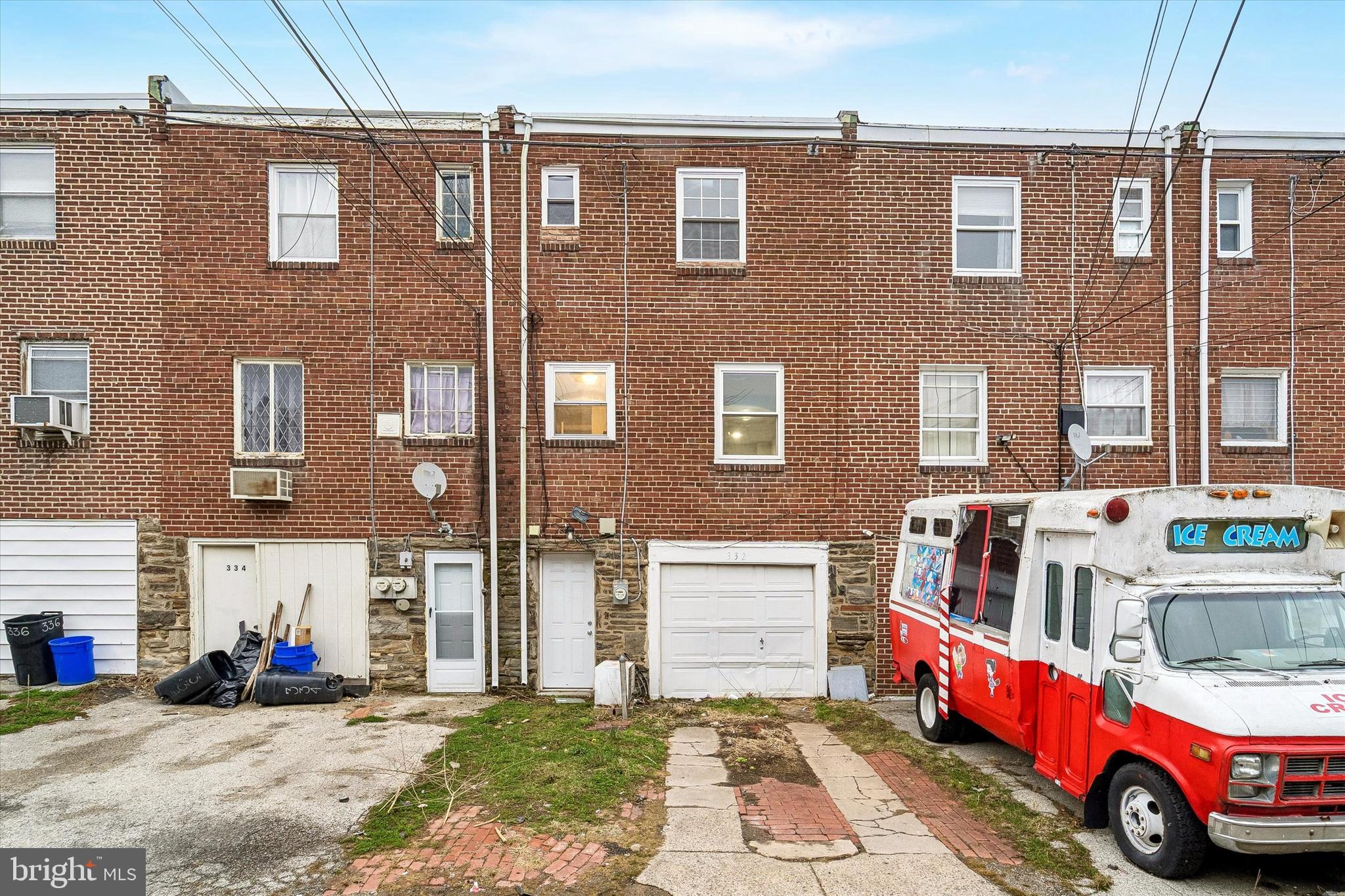 332 Springton Road Upper Darby, PA 19082 - Photo 15 of 15 a front view of a building with outdoor space