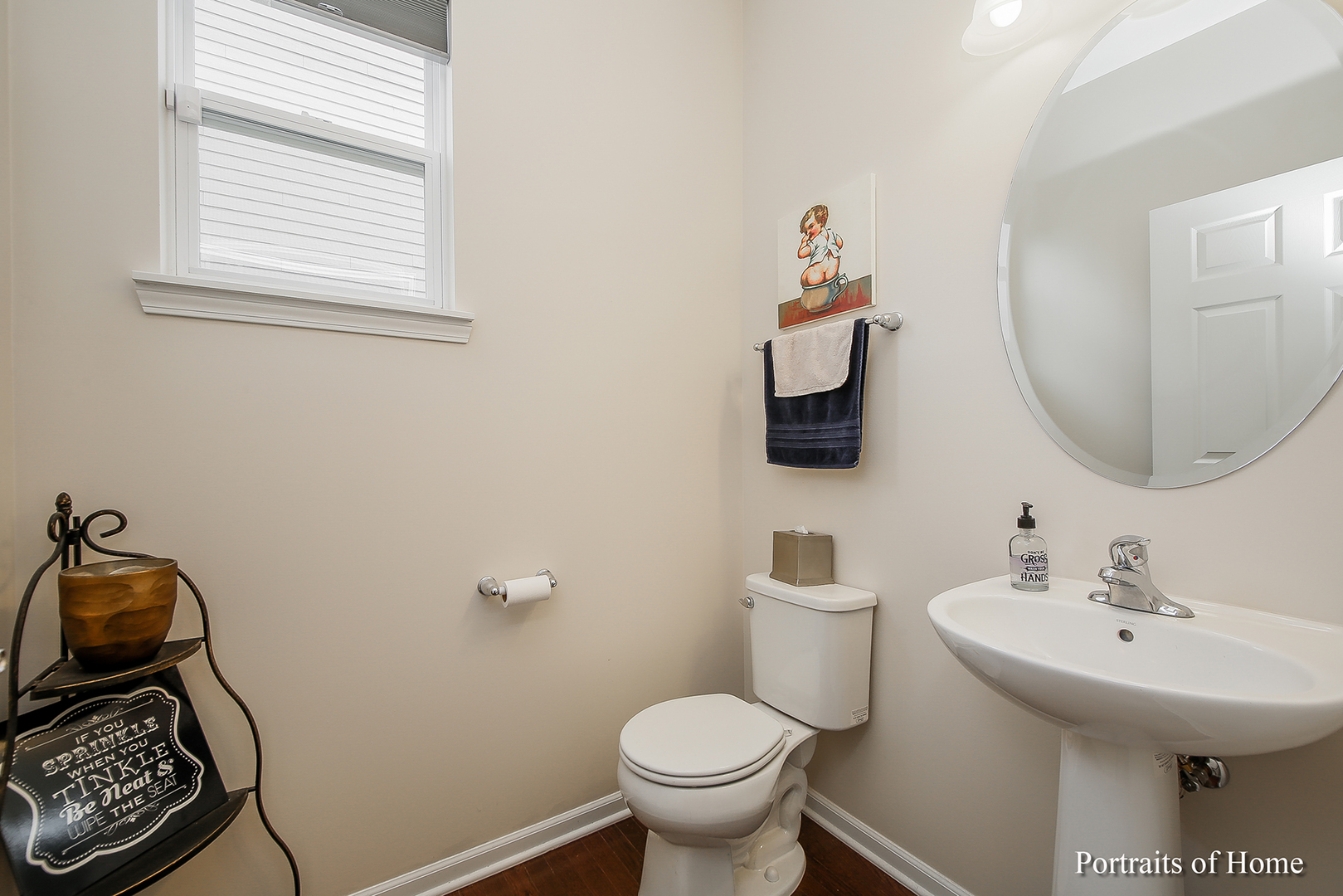 3740 Ryder Court Naperville, IL 60564 - Photo 12 of 25 a bathroom with a toilet sink and mirror
