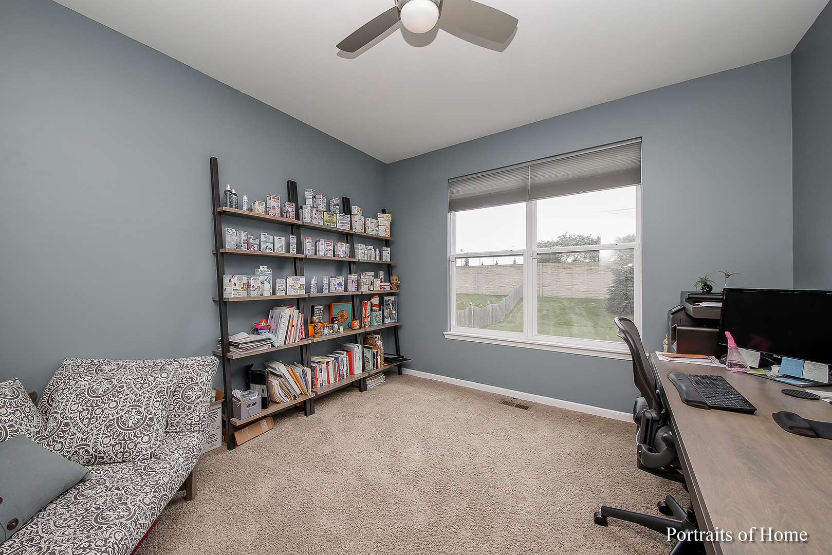 3740 Ryder Court Naperville, IL 60564 - Photo 14 of 25 a view of a livingroom with workspace and a window