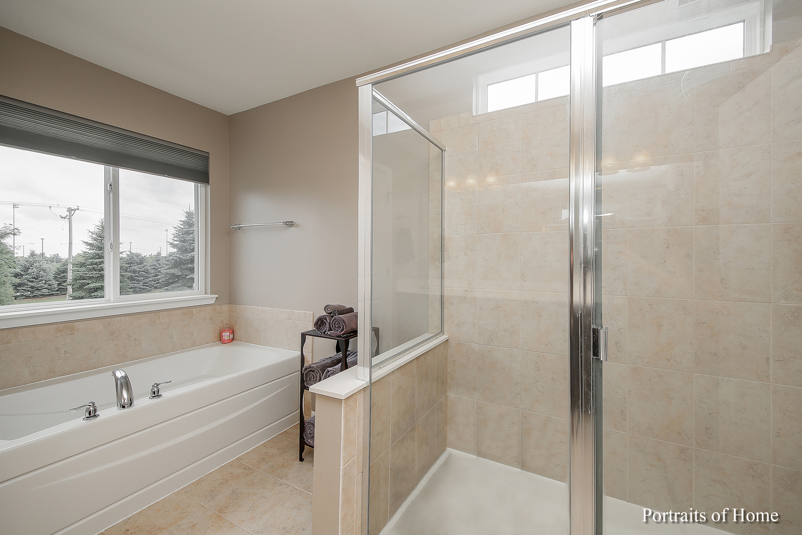 3740 Ryder Court Naperville, IL 60564 - Photo 18 of 25 a bathroom with a bathtub and a shower