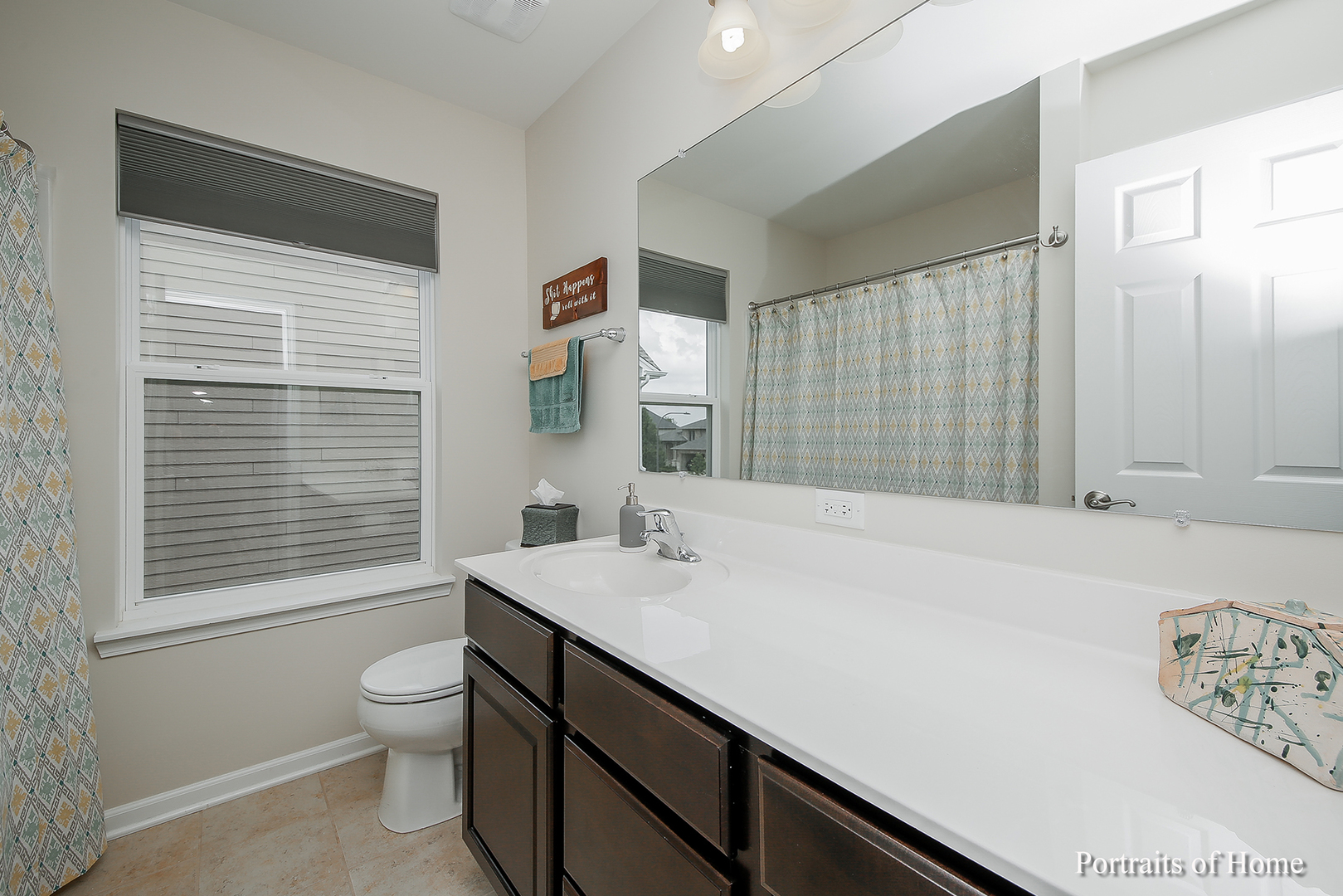 3740 Ryder Court Naperville, IL 60564 - Photo 20 of 25 a bathroom with a sink a toilet and shower