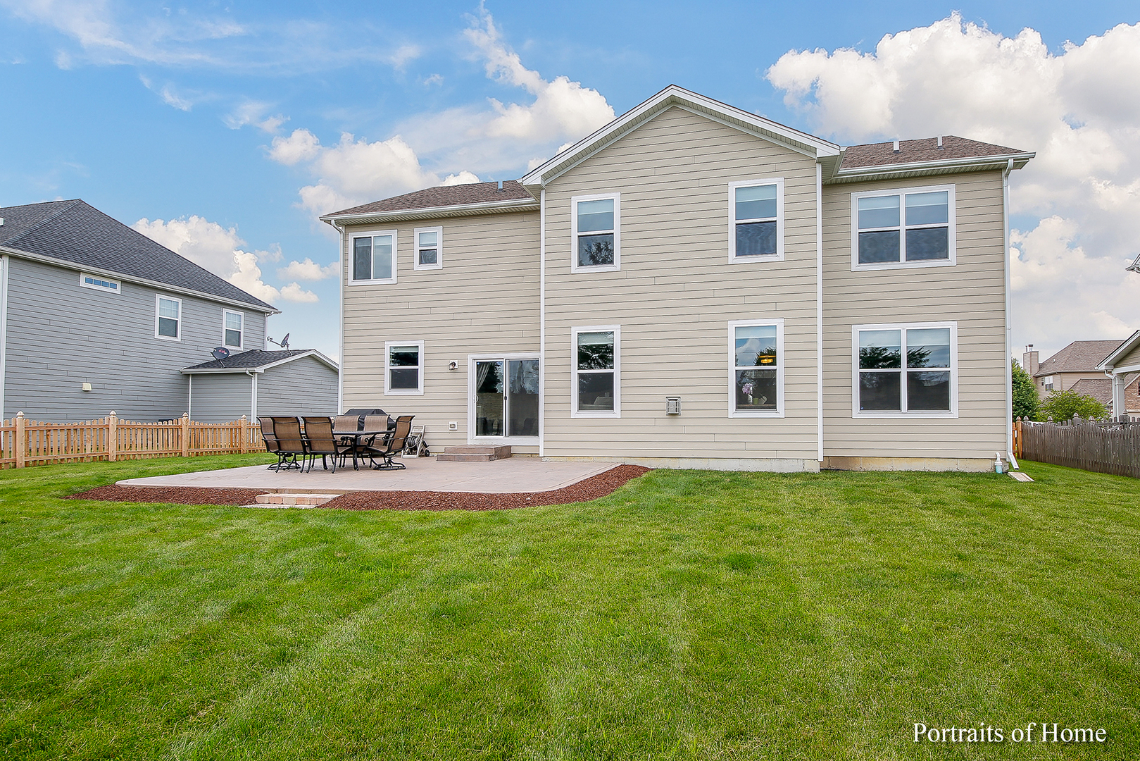 3740 Ryder Court Naperville, IL 60564 - Photo 25 of 25 a front view of a house with a yard and garage