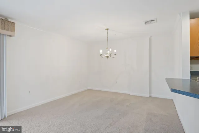 a bathroom with a sink a mirror and shower