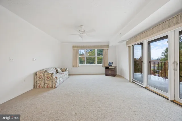 a kitchen that has a sink and a stove