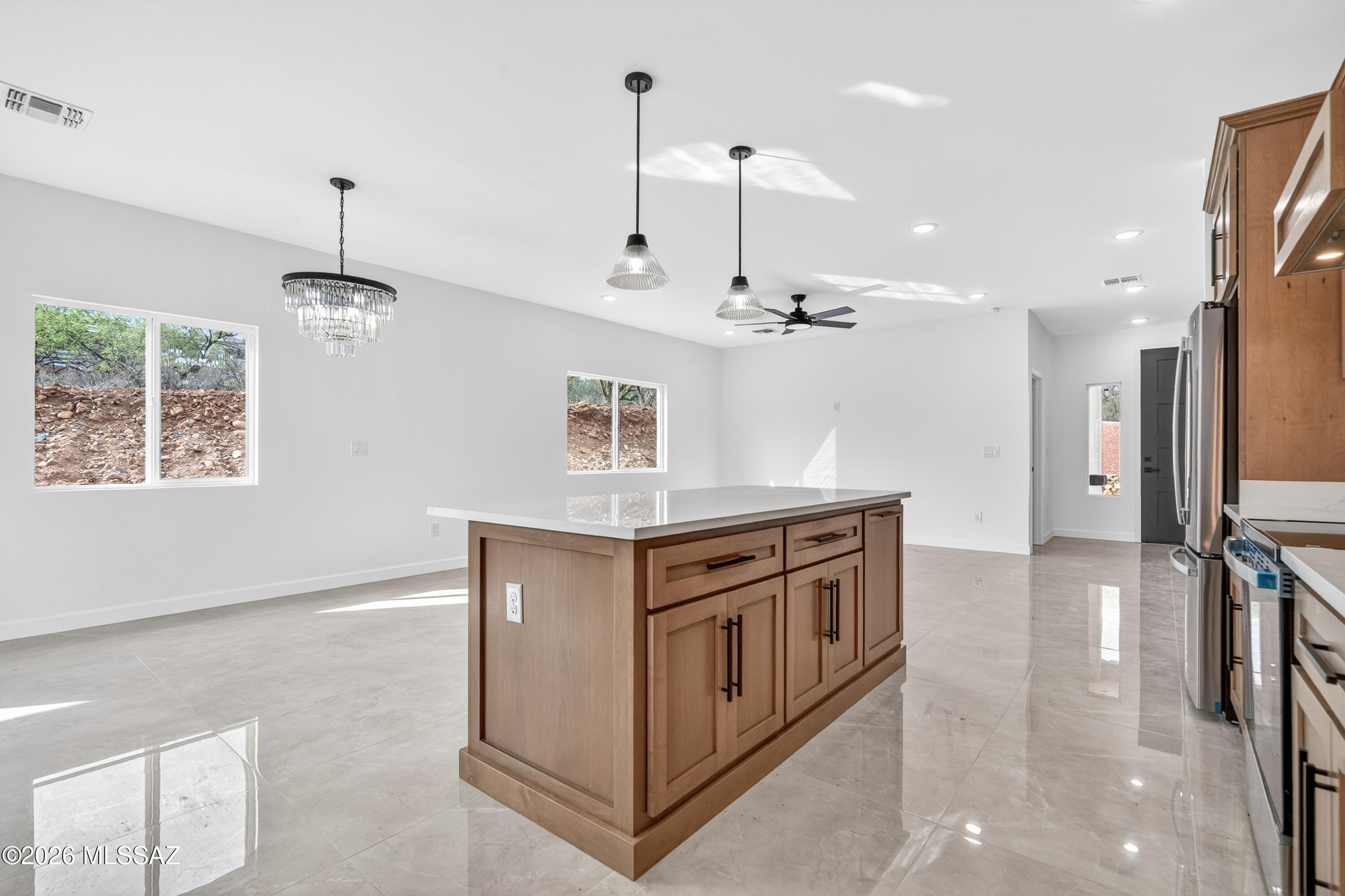 1834 Circulo Glorieta Rio Rico, AZ 85648 - Photo 15 of 35 a kitchen with stainless steel appliances granite countertop a stove and a sink