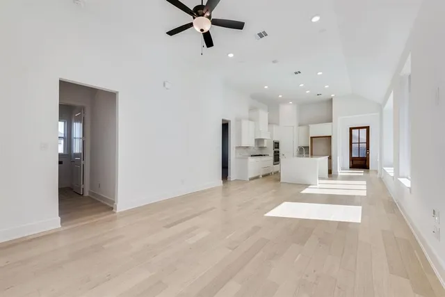 a kitchen with stainless steel appliances granite countertop a stove and a sink
