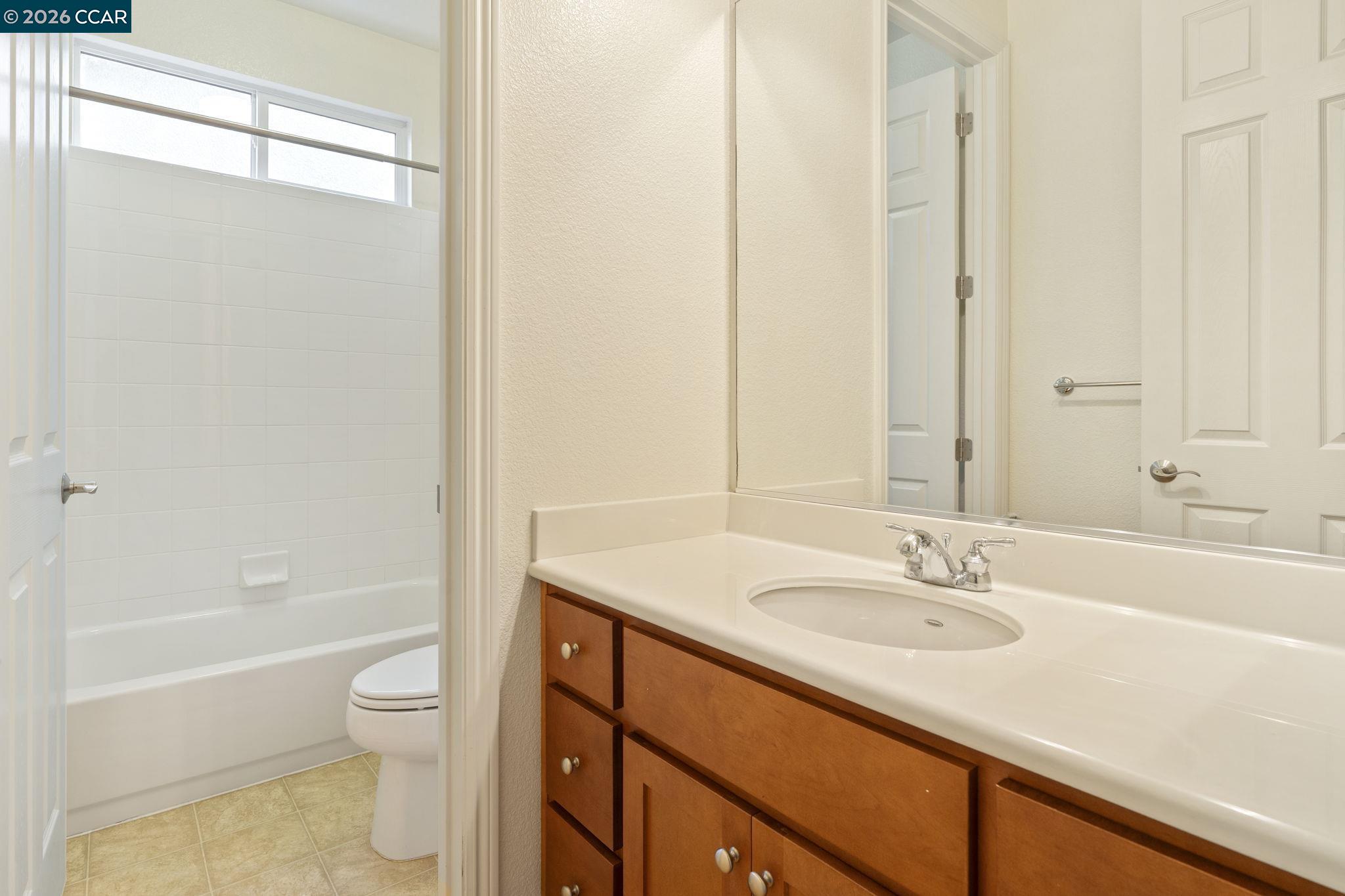 5141 Fern Ridge Circle Discovery Bay, CA 94505 - Photo 20 of 56 a bathroom with a sink toilet and shower