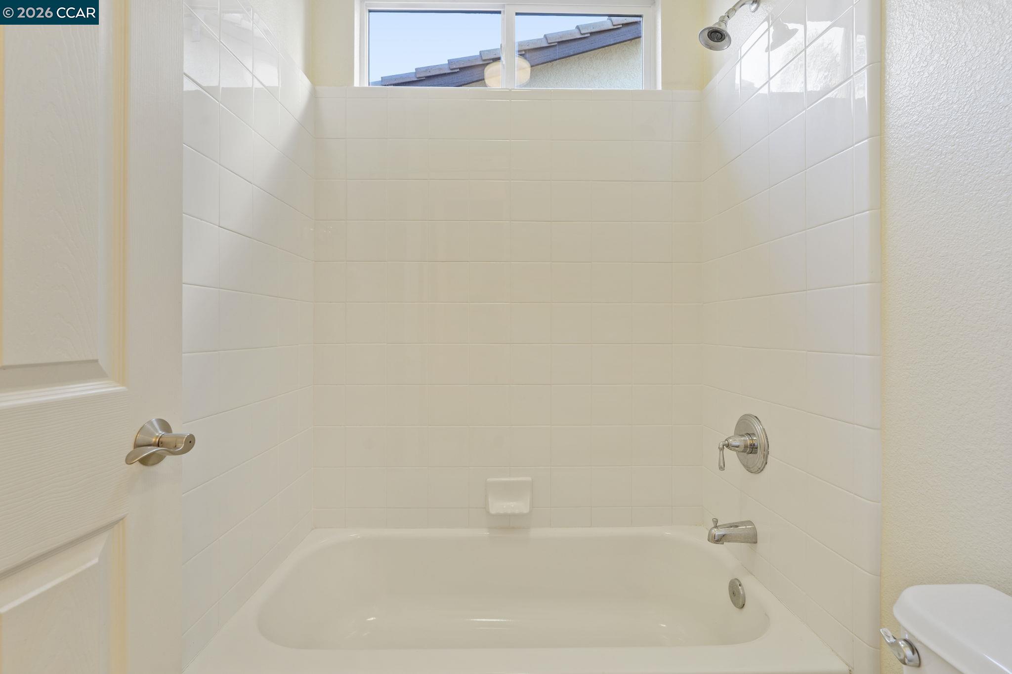 5141 Fern Ridge Circle Discovery Bay, CA 94505 - Photo 21 of 56 a close up of a bathtub curtain