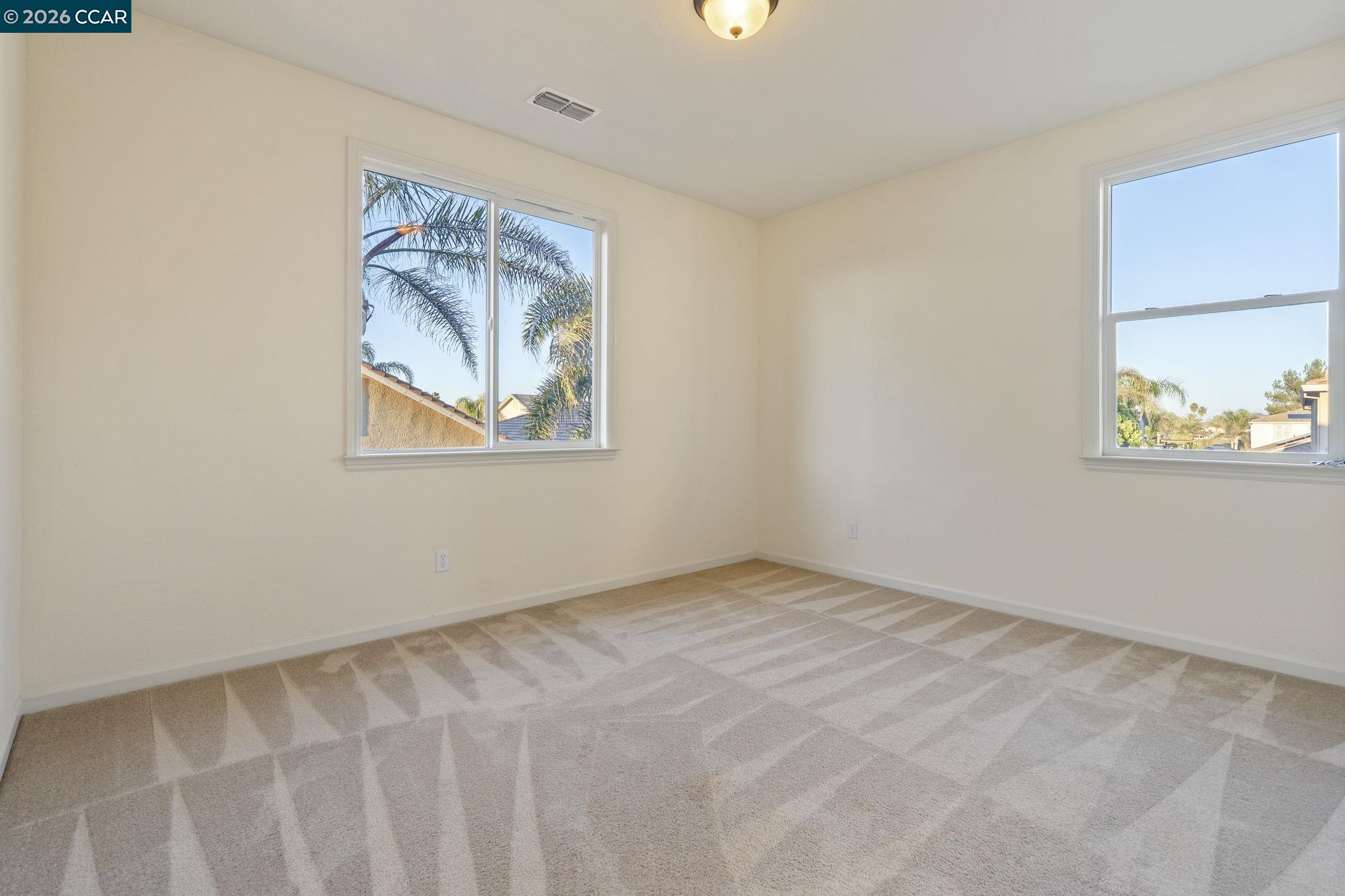 5141 Fern Ridge Circle Discovery Bay, CA 94505 - Photo 31 of 56 an empty room with windows