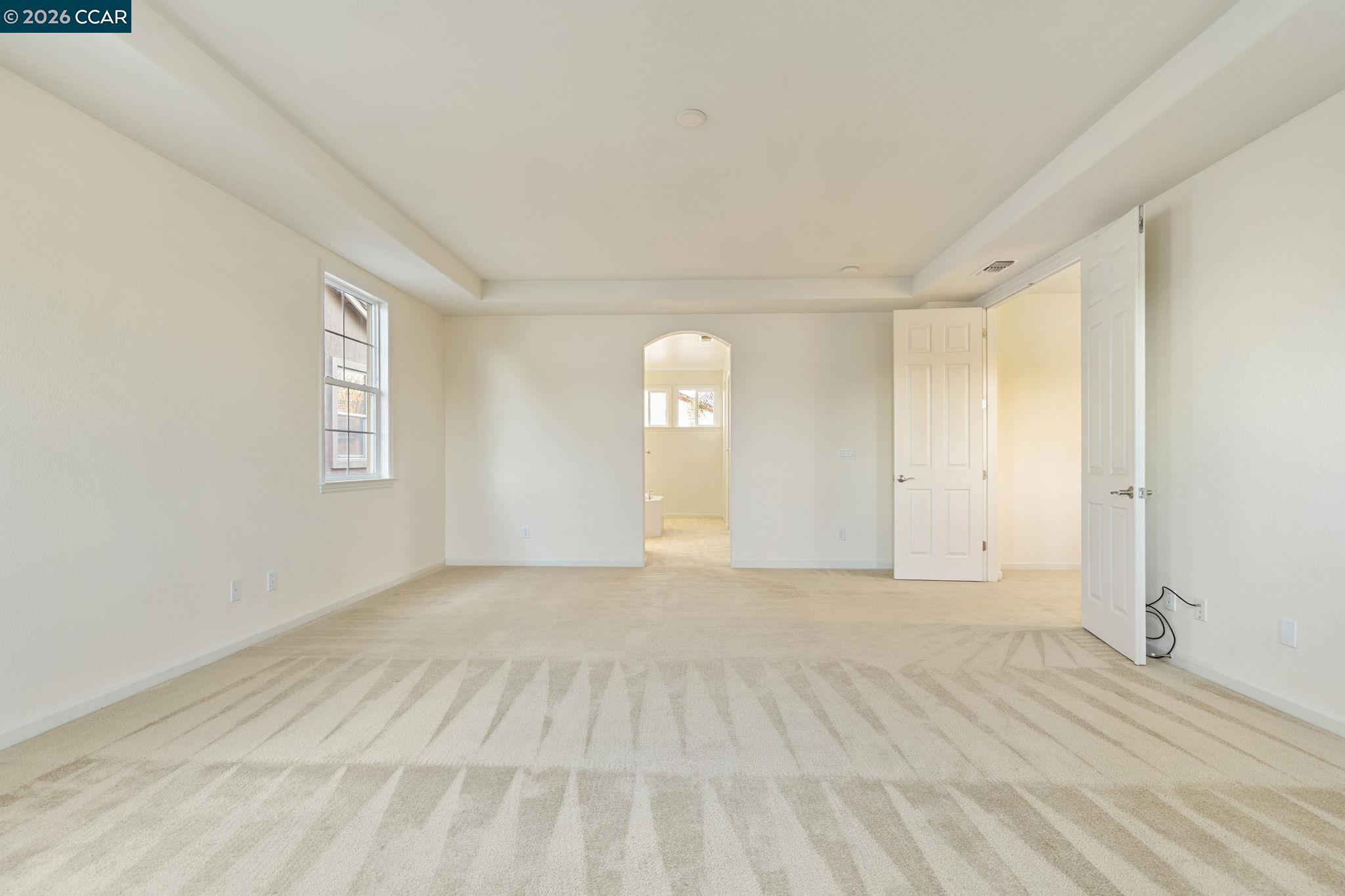 5141 Fern Ridge Circle Discovery Bay, CA 94505 - Photo 39 of 56 a view of an empty room with window and wooden floor