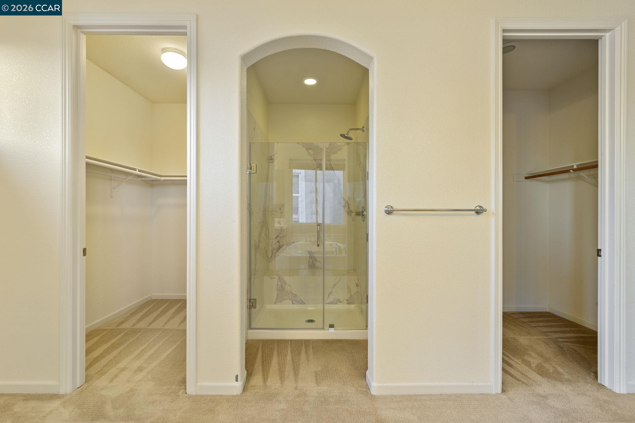 5141 Fern Ridge Circle Discovery Bay, CA 94505 - Photo 44 of 56 a bathroom with a glass shower door