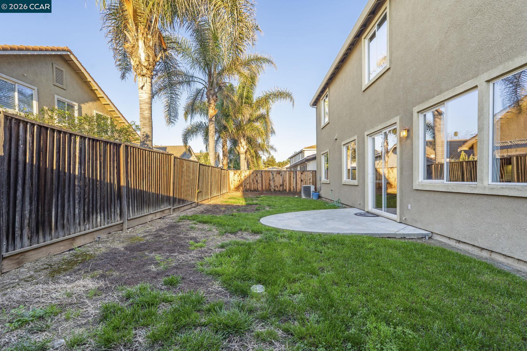 5141 Fern Ridge Circle Discovery Bay, CA 94505 - Photo 46 of 56 a view of a house with a yard and pathway