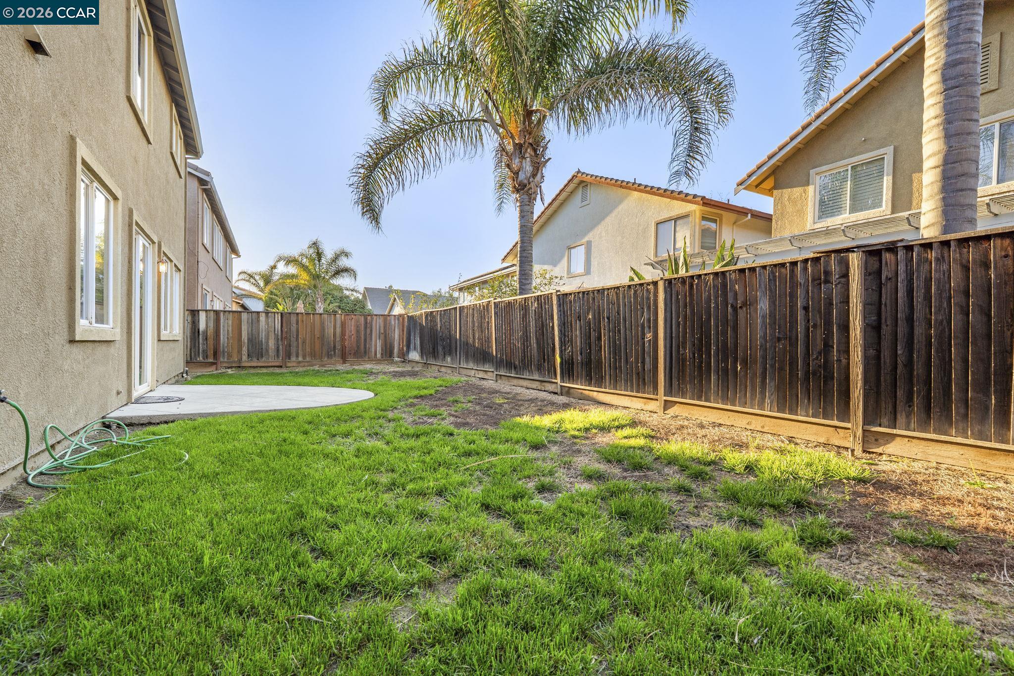 5141 Fern Ridge Circle Discovery Bay, CA 94505 - Photo 47 of 56 a view of a backyard with a garden