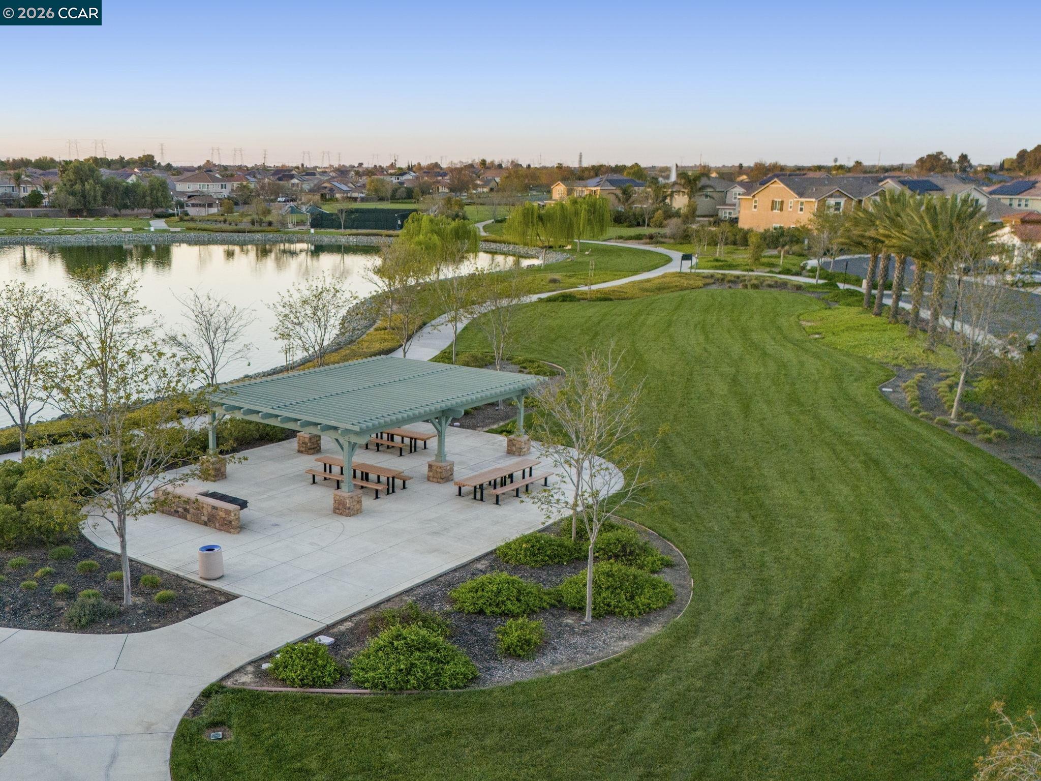 5141 Fern Ridge Circle Discovery Bay, CA 94505 - Photo 51 of 56 a view of a lake with a yard