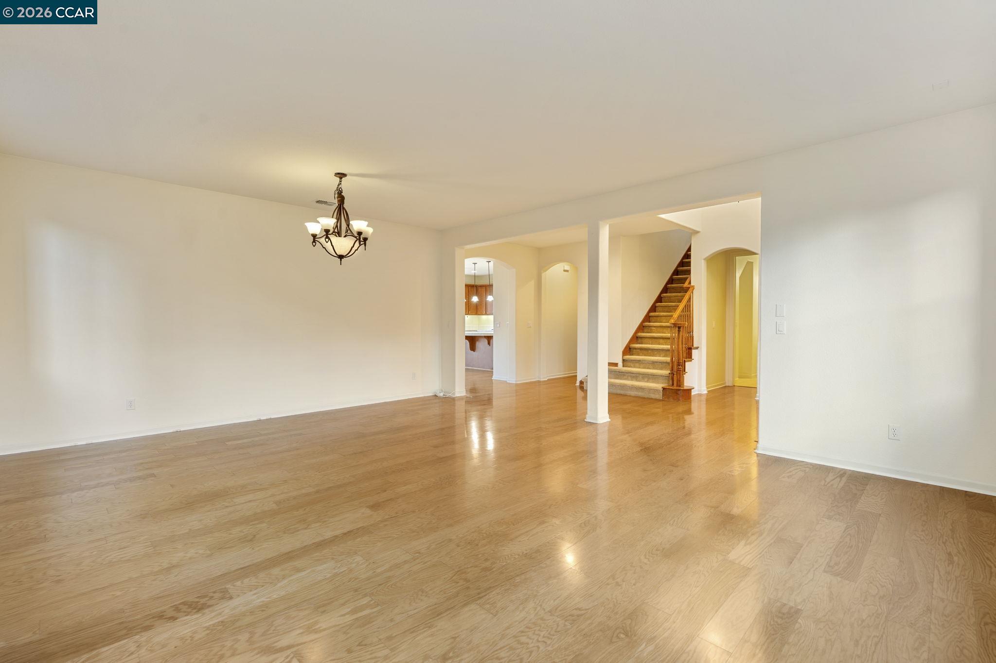 5141 Fern Ridge Circle Discovery Bay, CA 94505 - Photo 7 of 56 a view of an empty room with wooden floor