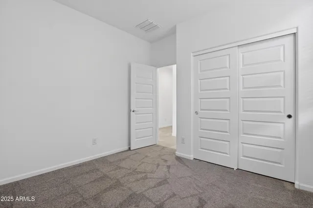 a view of walk in closet with cabinet