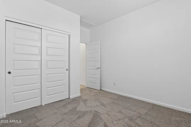 an empty room with closet
