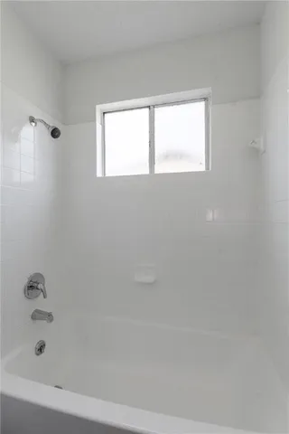 a bathroom with a bathtub