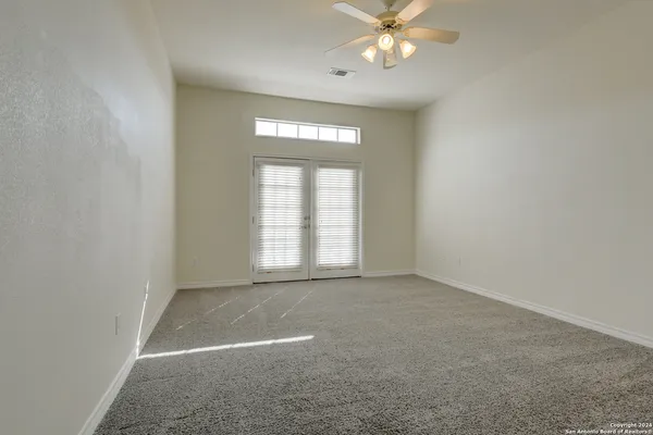 an empty room with an entryway
