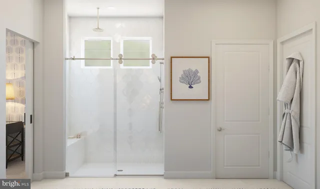 a bathroom with a shower and a sink