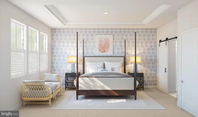 a bedroom with a bed and a couch