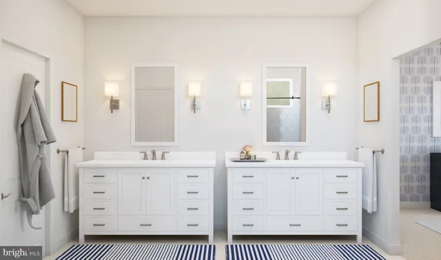 a spacious bathroom with a double vanity sink a mirror a vanity and a