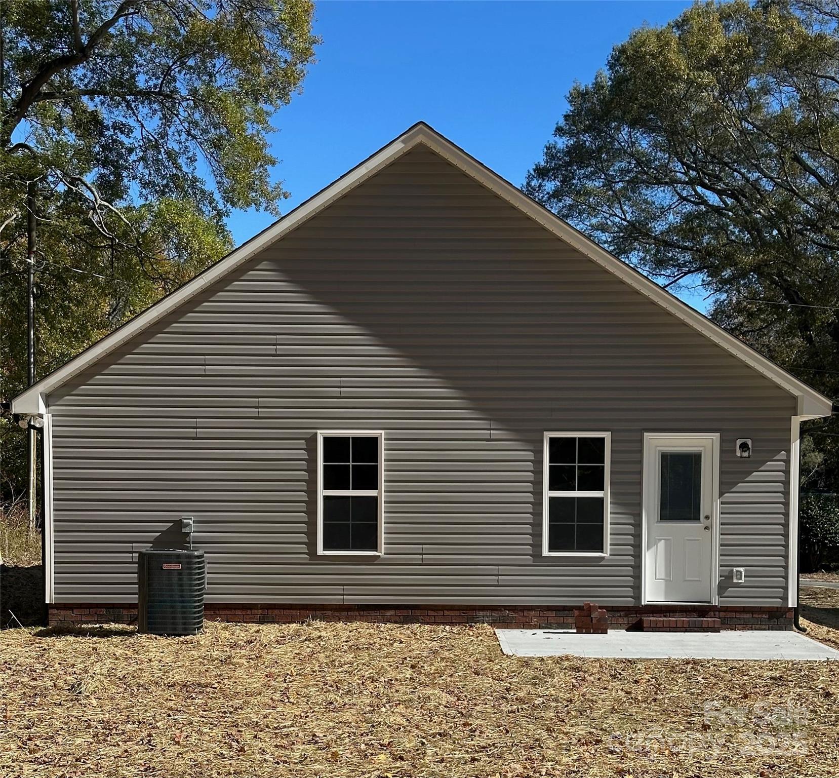 84 Highland Avenue Southwest Concord, NC 28027 - Photo 7 of 7 a backyard of a house