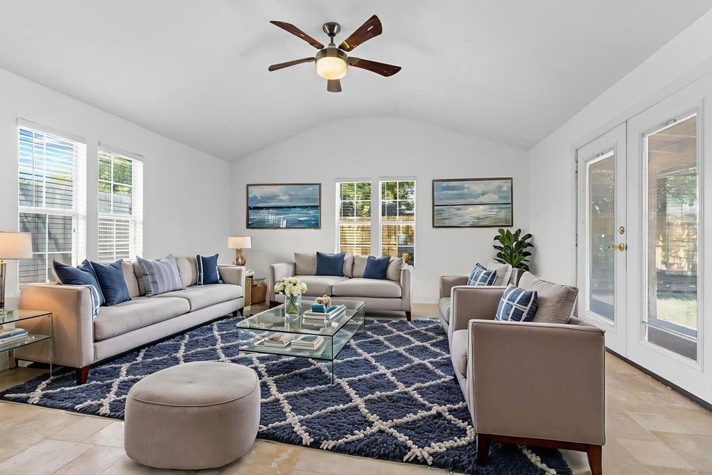 8918 Grape Street Houston, TX 77036 - Photo 13 of 40 a living room with furniture and a large window