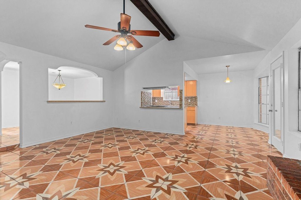 8918 Grape Street Houston, TX 77036 - Photo 14 of 40 a view of empty room with wooden floor