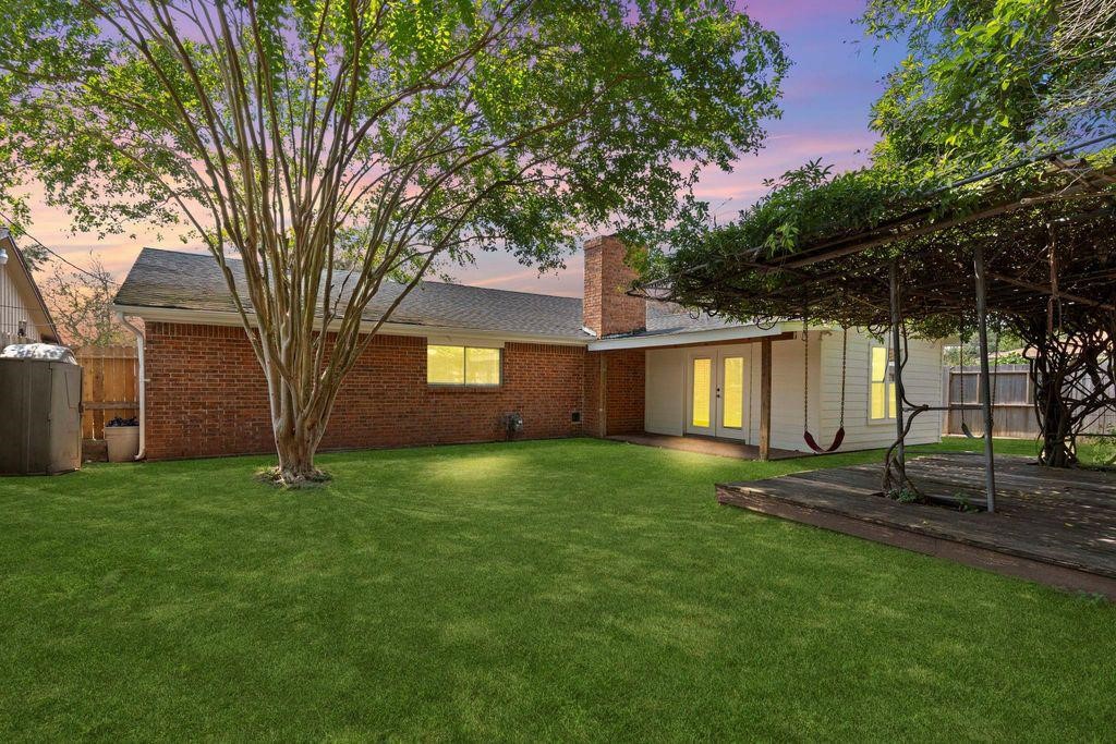 8918 Grape Street Houston, TX 77036 - Photo 39 of 40 a house with trees in the background