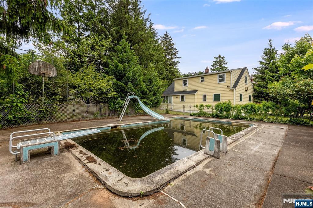 66 Coeyman Avenue Bloomfield, NJ 07003 - Photo 28 of 29 a view of a swimming pool with a patio