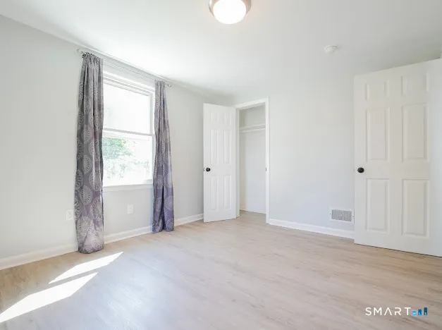 an empty room with window