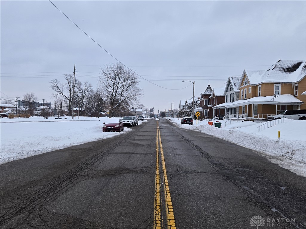 727 West High Street Springfield, OH 45506 - Photo 29 of 29 This scenic street showcases charming homes and vast open spaces under a winter sky.