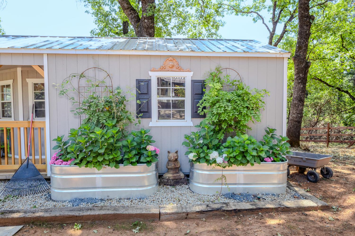 27689 Table Meadow Road Auburn, CA 95602 - Photo 61 of 72 a view of a house with potted plants and a fountain
