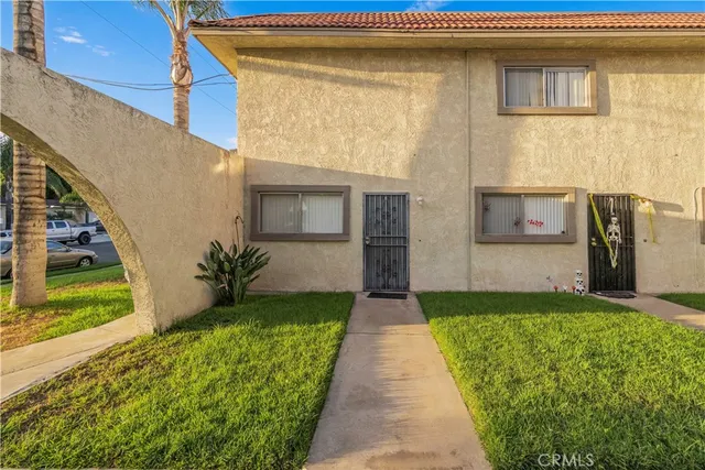 a view of a house with a street