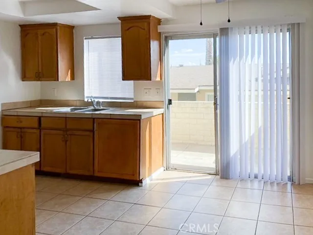 a kitchen with a stove and a microwave