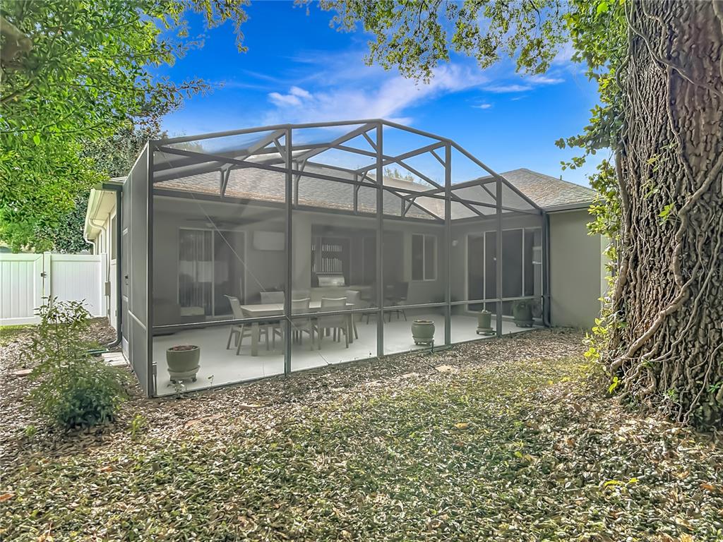277 Magneta Loop Auburndale, FL 33823 - Photo 44 of 58 a view of a house with a yard