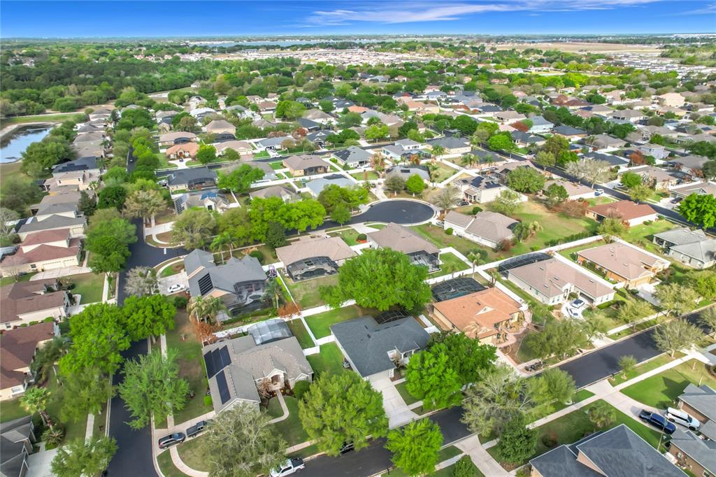 277 Magneta Loop Auburndale, FL 33823 - Photo 49 of 58 an aerial view of residential houses with outdoor space