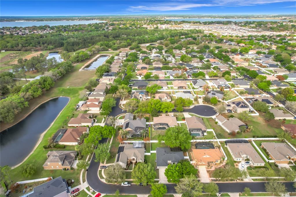 277 Magneta Loop Auburndale, FL 33823 - Photo 53 of 58 an aerial view of residential houses with outdoor space