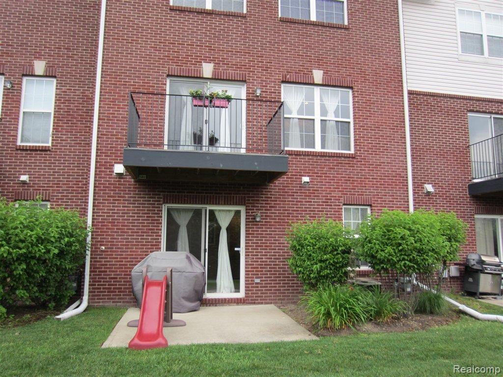 503 Cherry Orchard Road, Unit 93 Canton, MI 48188 - Photo 19 of 20 Rear View