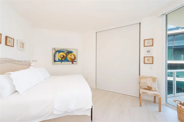 a bathroom with a toilet sink and shower