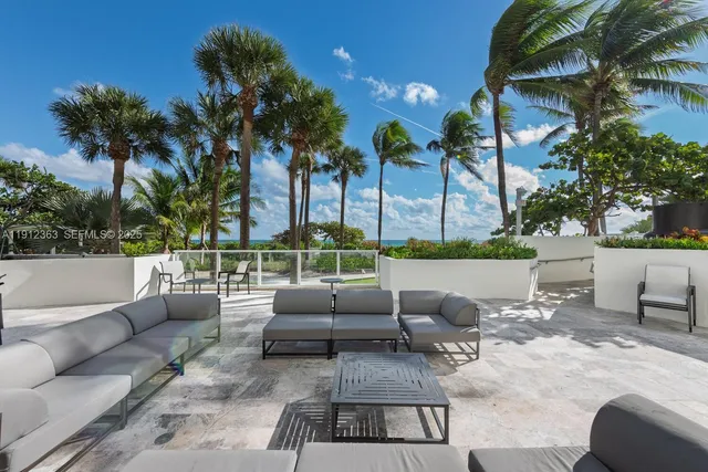 an aerial view of a multi story residential apartment building