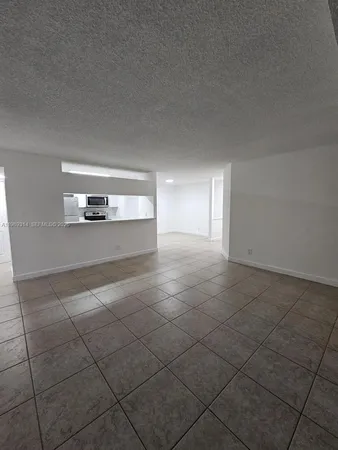 a view of a livingroom and window