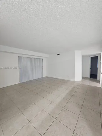 an empty room with a natural light