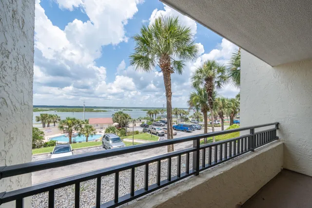 a view of a garden from a balcony