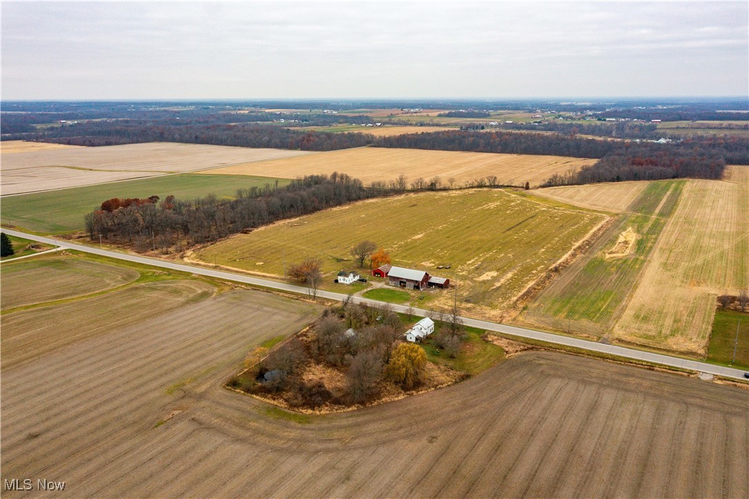 12402 Greenwich Road Homerville, OH 44235 - Photo 12 of 21 Aerial view of property and surrounding area with rural landscape and farmland