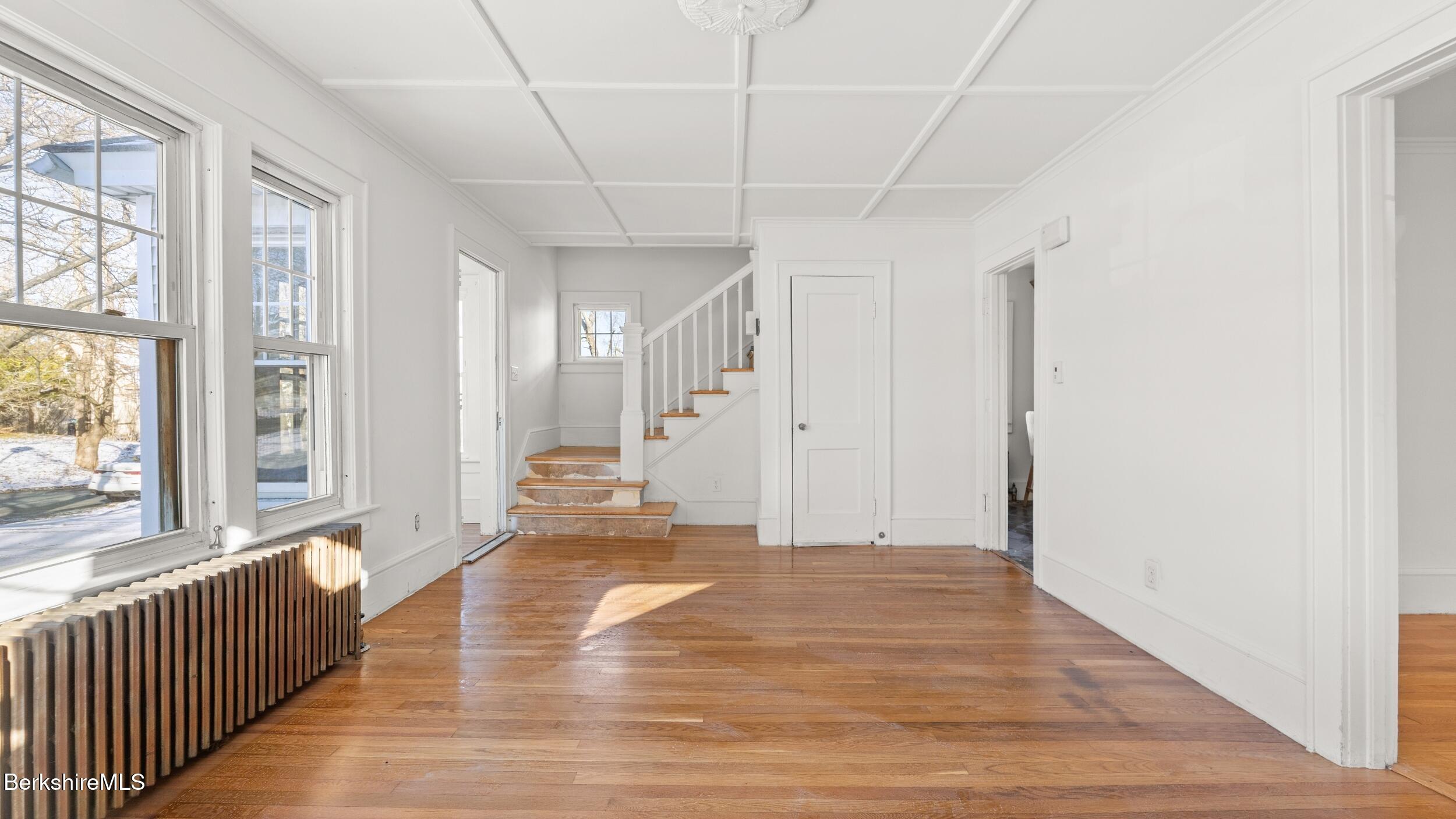 121 Edward Avenue Pittsfield, MA 01201 - Photo 17 of 22 a view of a room with wooden floor and windows
