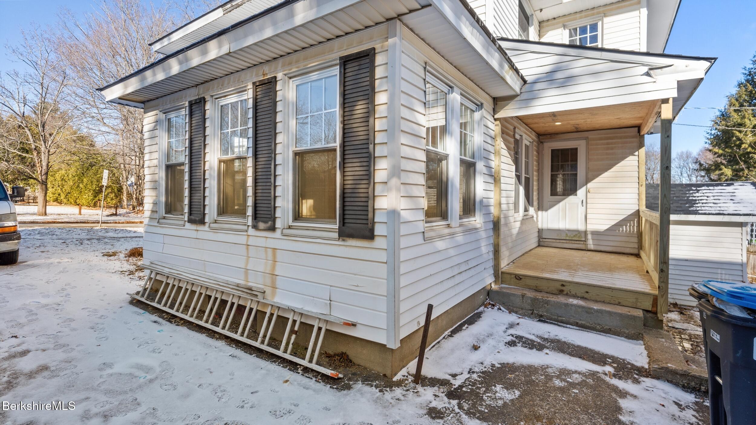 121 Edward Avenue Pittsfield, MA 01201 - Photo 4 of 22 a view of a house with a large window