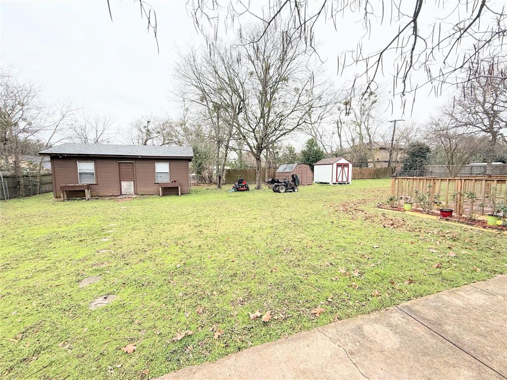 112 Meadow Lane Groesbeck, TX 76642 - Photo 32 of 37 a view of a house with a yard and sitting area